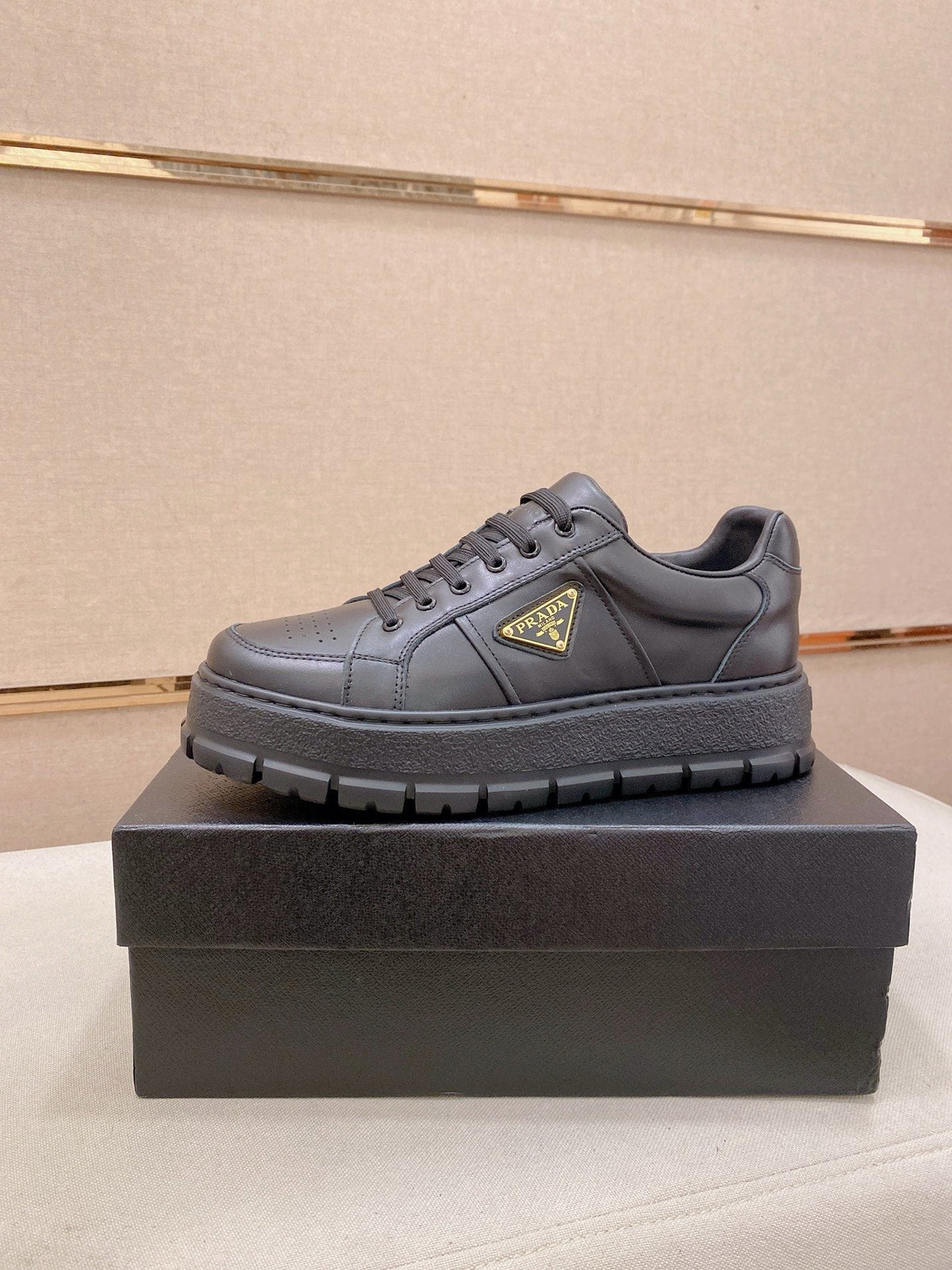 Prada Triangle Plaque Low-Top Sneakers - Lugged Sole