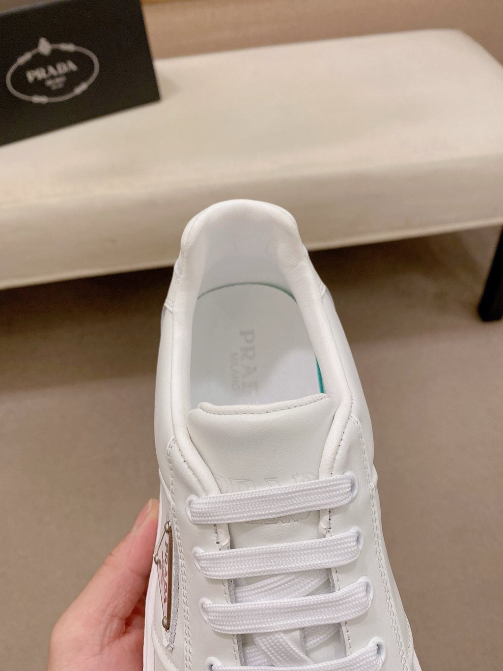 Prada Triangle Plaque Low-Top Sneakers - Lugged Sole